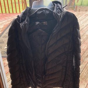 A grey medium Michael Kors coat.